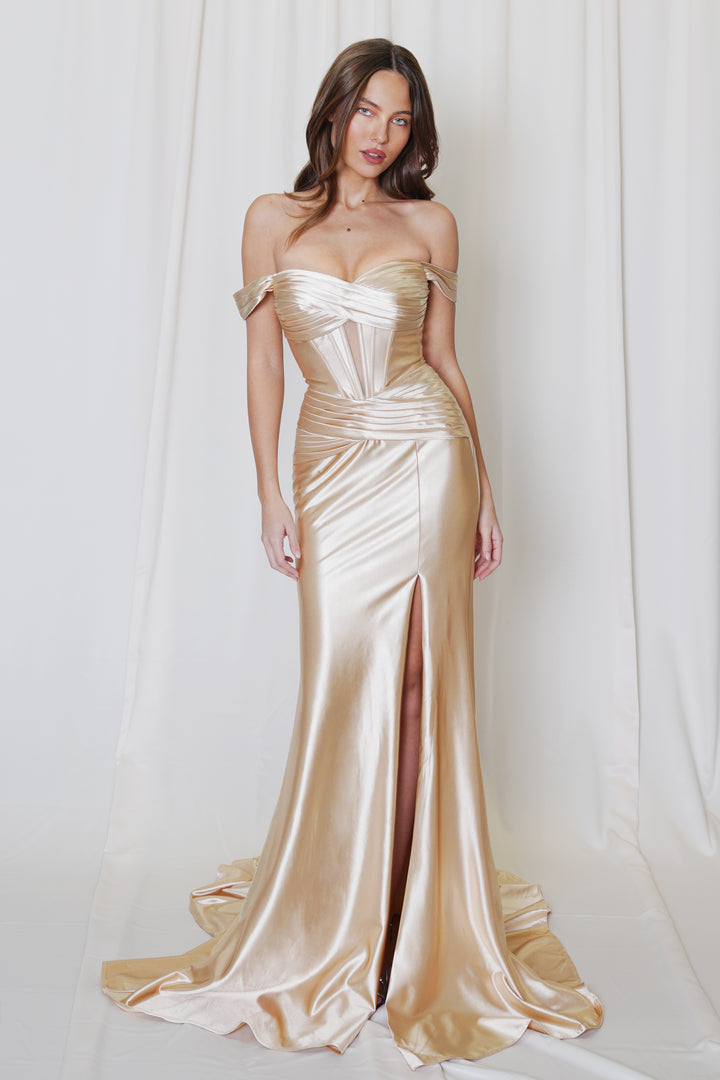 Satin Fitted Off Shoulder Slit Gown by Juno M1043